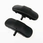 Two black plastic components on a white background