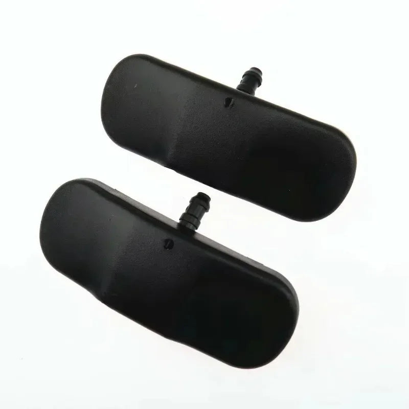 Two black oval mirrors on a white background