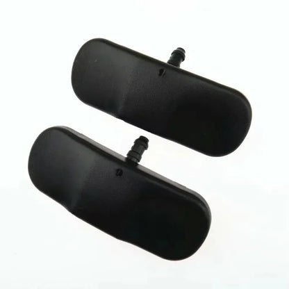 Two black oval mirrors on a white background